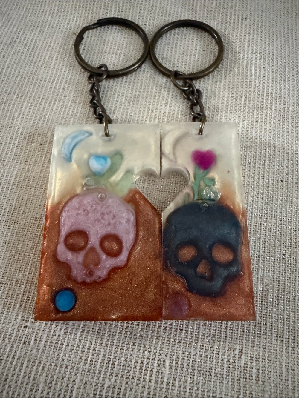 Resin Skull Heart Keychain Set — Pink & Black Skulls with Coppery Base
